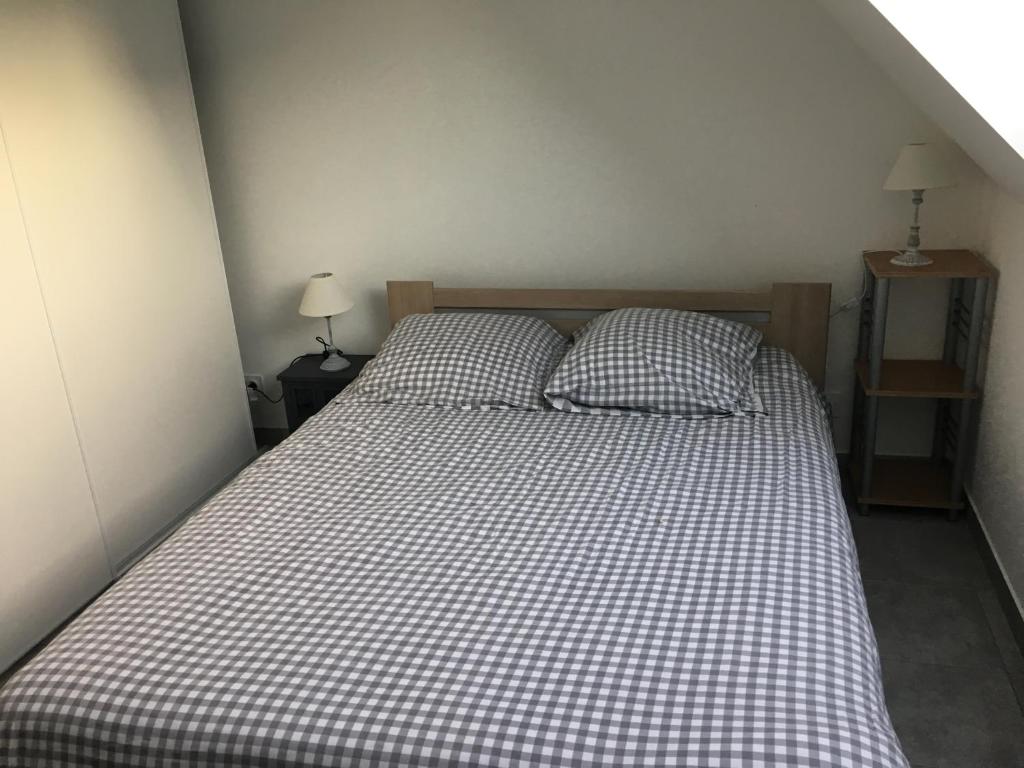Postel nebo postele na pokoji v ubytování Gite les Falaises de Criel