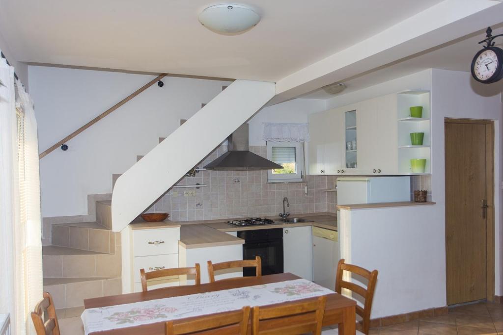Kuchyňa alebo kuchynka v ubytovaní Gospodar Apartments