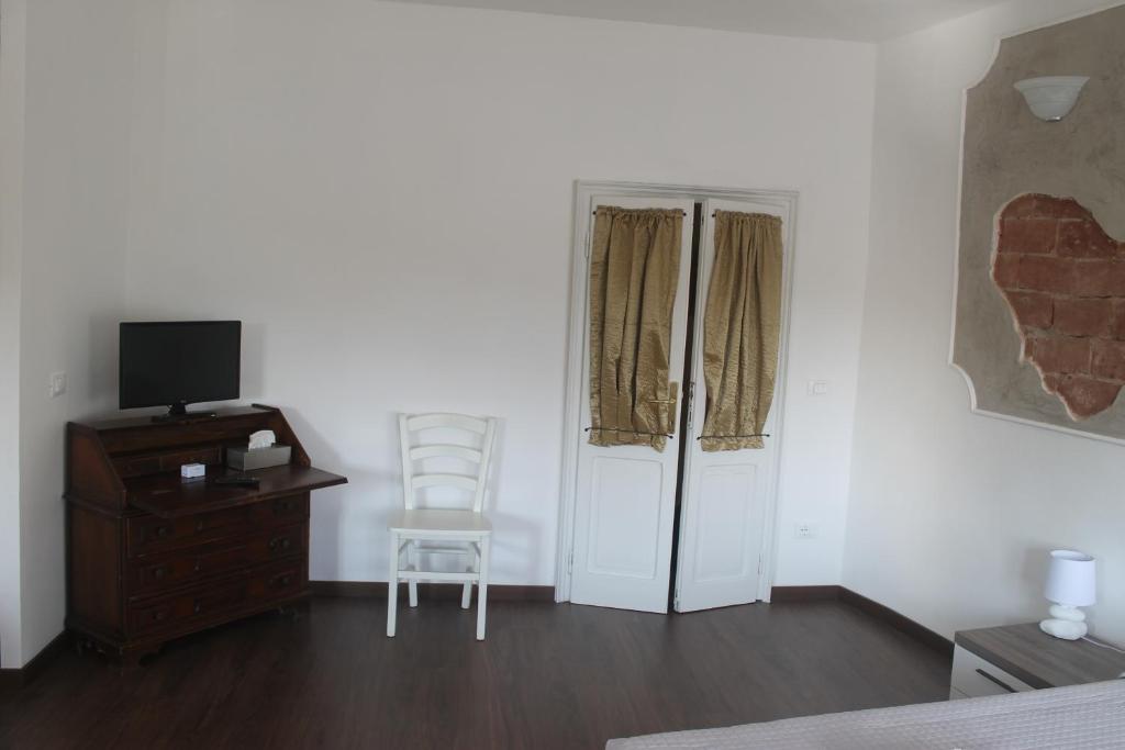 TV a/nebo společenská místnost v ubytování Residenza San Tomaso