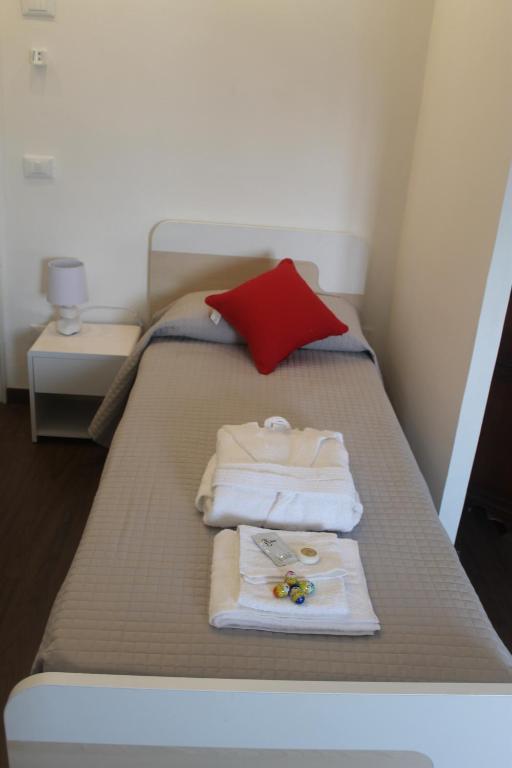 Postel nebo postele na pokoji v ubytování Residenza San Tomaso