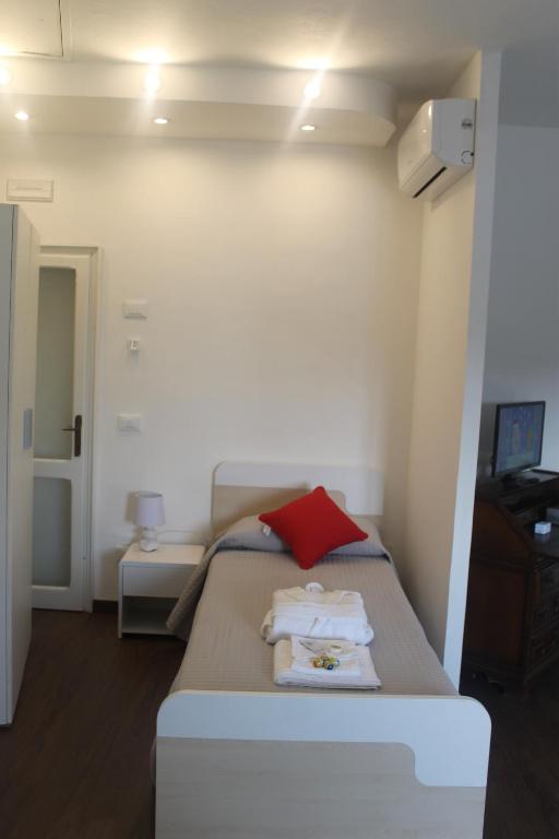 Postel nebo postele na pokoji v ubytování Residenza San Tomaso