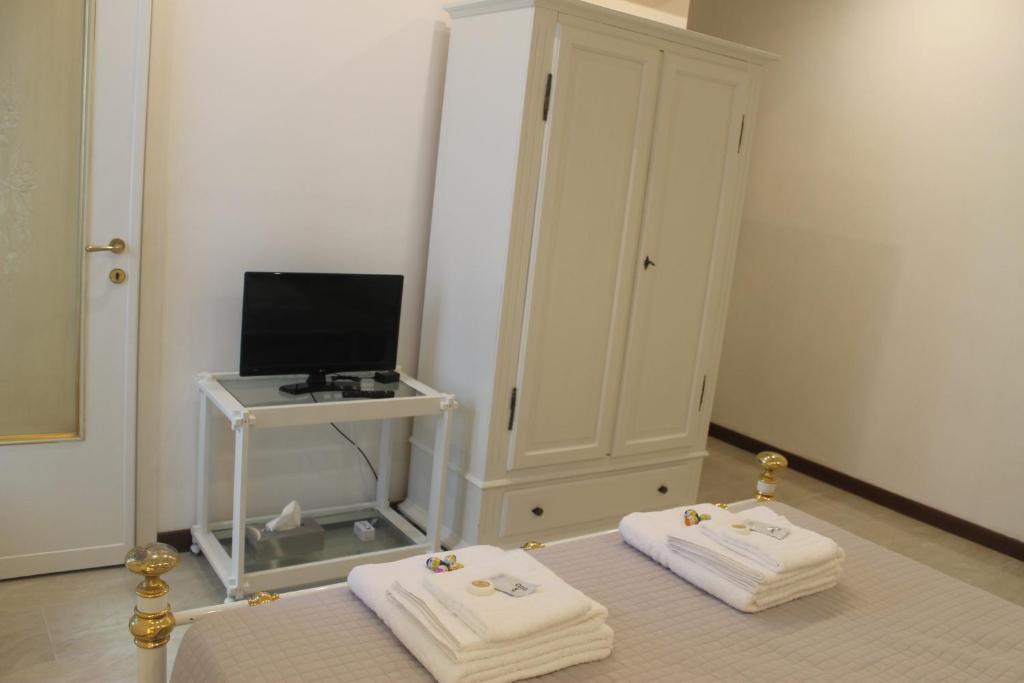 TV a/nebo společenská místnost v ubytování Residenza San Tomaso