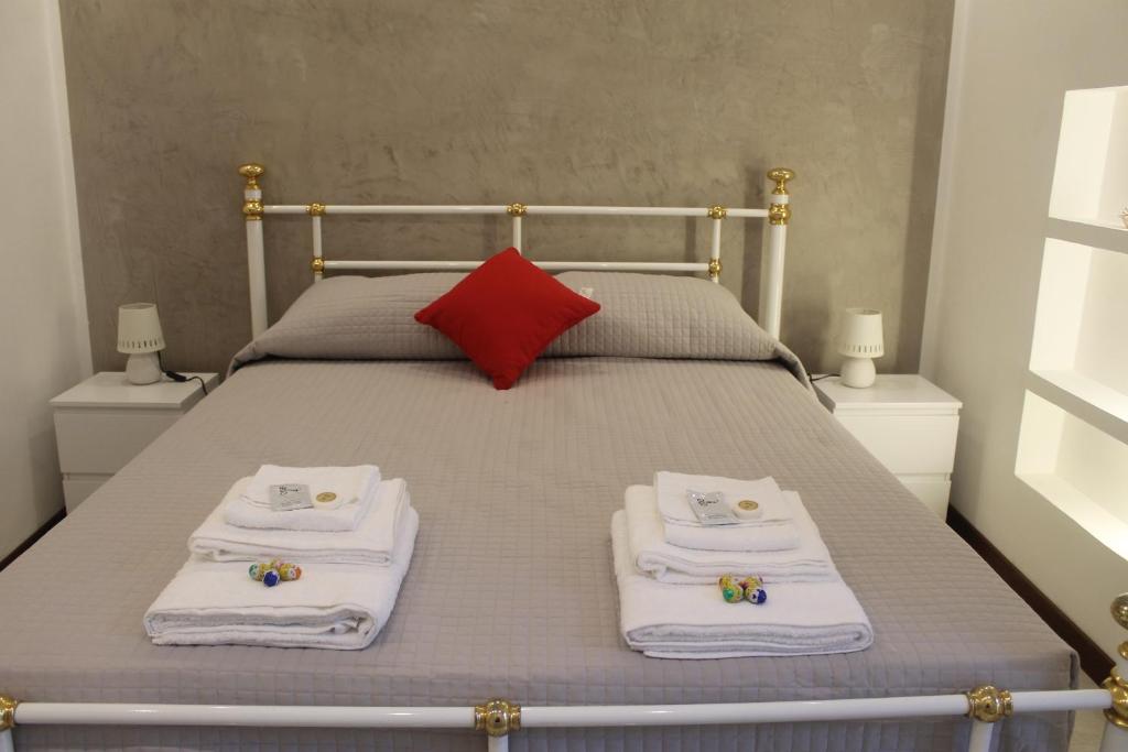 Postel nebo postele na pokoji v ubytování Residenza San Tomaso
