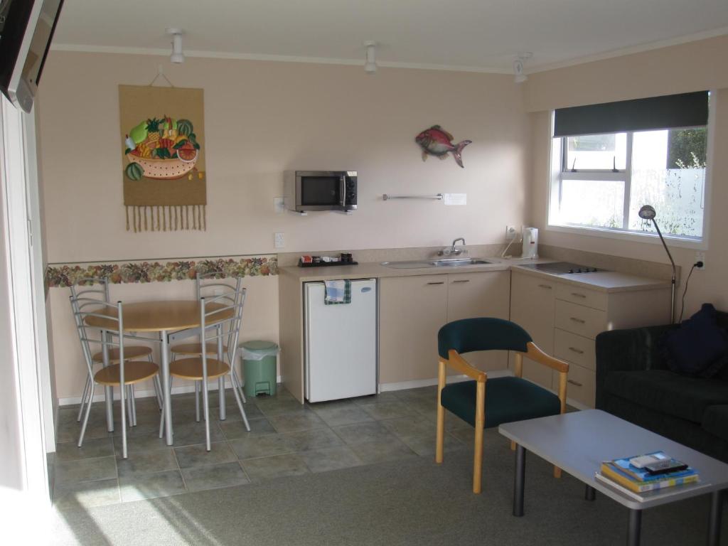 Kuchyň nebo kuchyňský kout v ubytování Cook's Lookout Motel