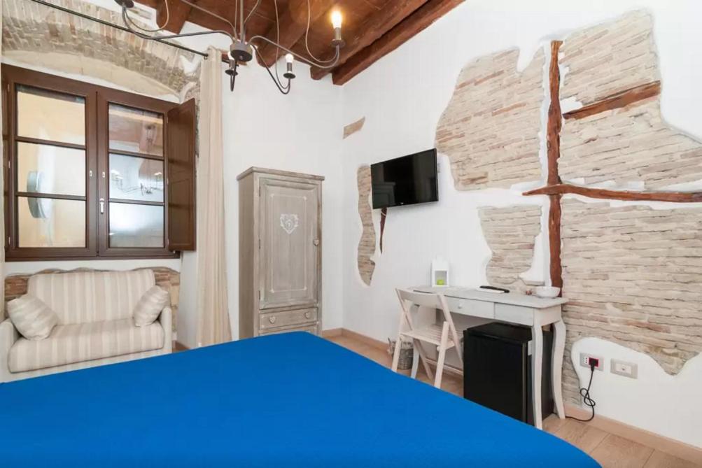 TV a/nebo společenská místnost v ubytování Archè