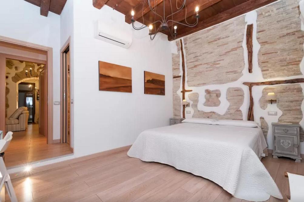 Postel nebo postele na pokoji v ubytování Archè