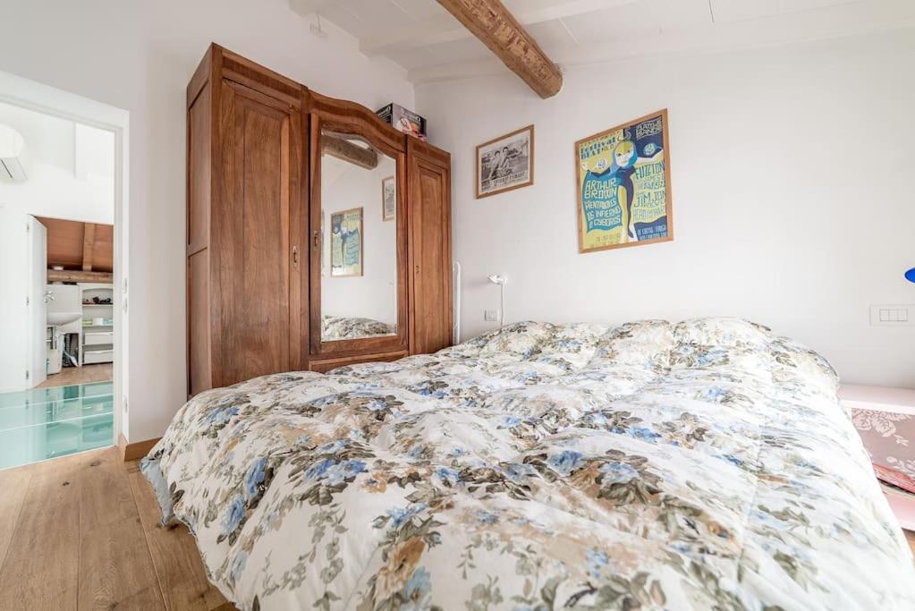 A bed or beds in a room at La Casina