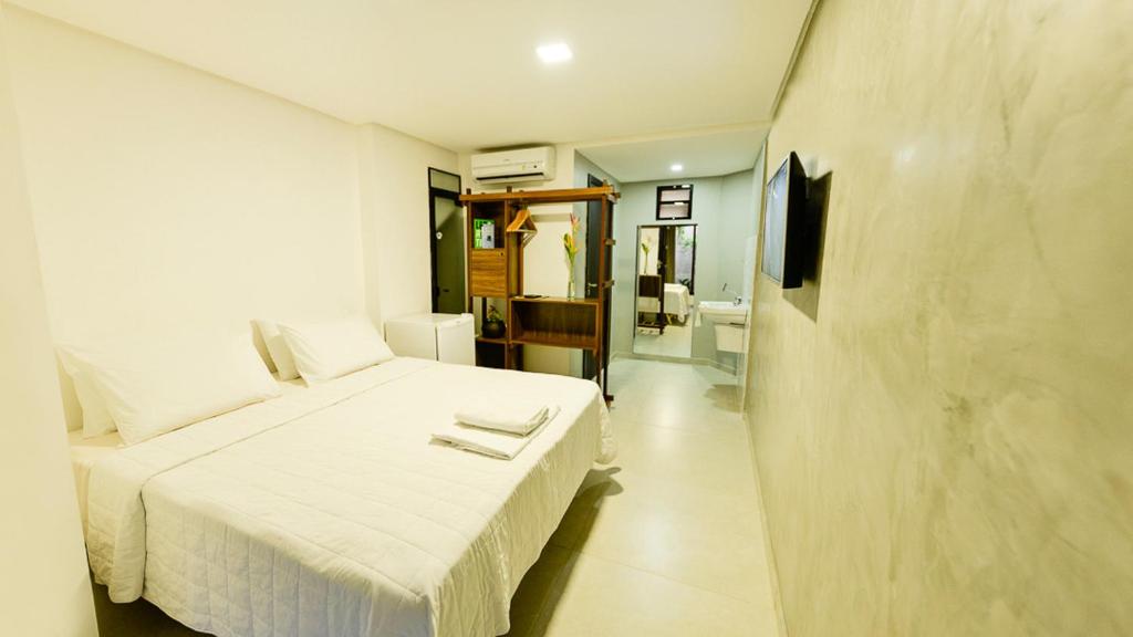 Postel nebo postele na pokoji v ubytování Xilo Design Hotel