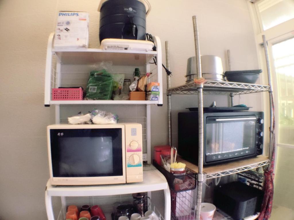Kuchyň nebo kuchyňský kout v ubytování Backpacker B&B