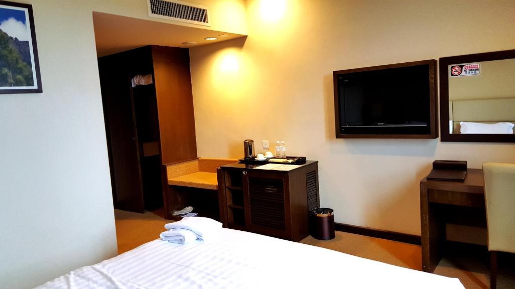 TV a/nebo společenská místnost v ubytování Lintas View Hotel