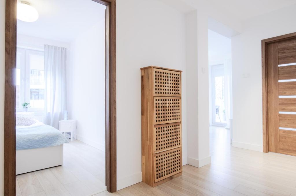 Posteľ alebo postele v izbe v ubytovaní Apartament z basenem Polanki