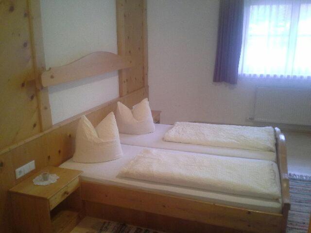 Postel nebo postele na pokoji v ubytování Sägehof
