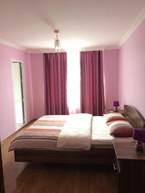 Postel nebo postele na pokoji v ubytování Mari Guest House