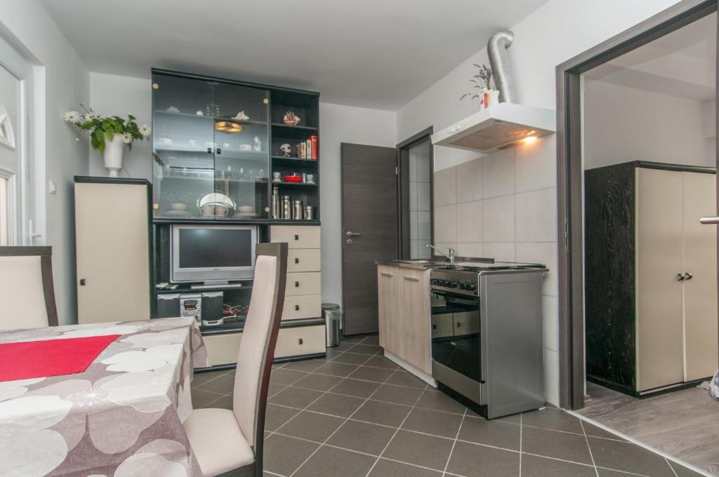 Kuchyň nebo kuchyňský kout v ubytování Zora Apartment