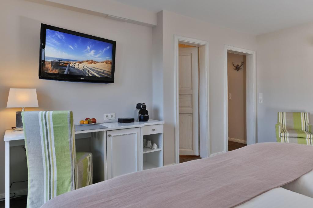 Postel nebo postele na pokoji v ubytování Hotel Uthland