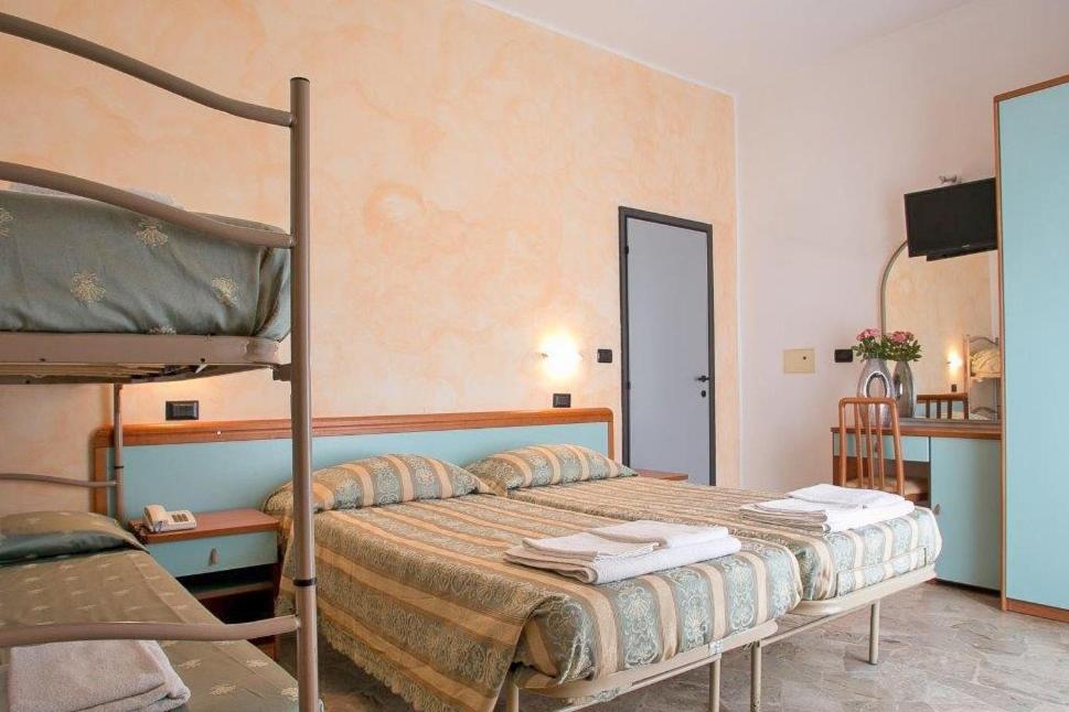 Postel nebo postele na pokoji v ubytování Hotel Vernel