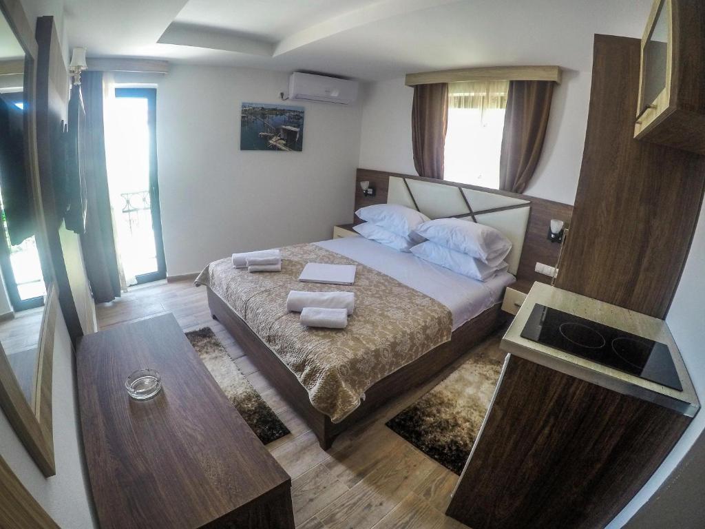 Cama o camas de una habitación en Apartments Timoni