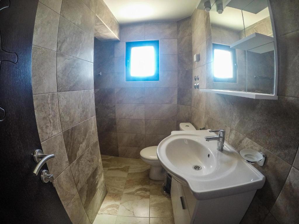 Un baño de Apartments Timoni