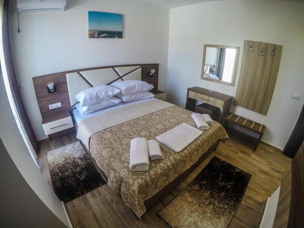 Cama o camas de una habitación en Apartments Timoni