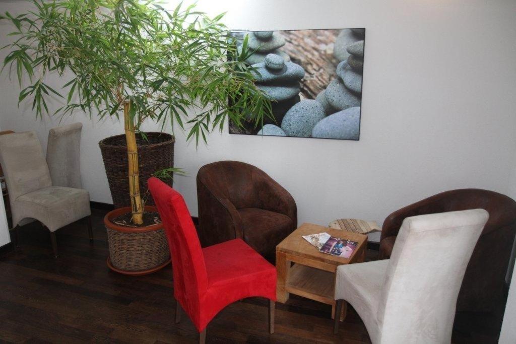 Posezení v ubytování Hotel Le Suroit