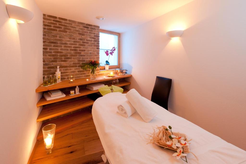 Postel nebo postele na pokoji v ubytování Hotel Hemizeus & Iremia Spa