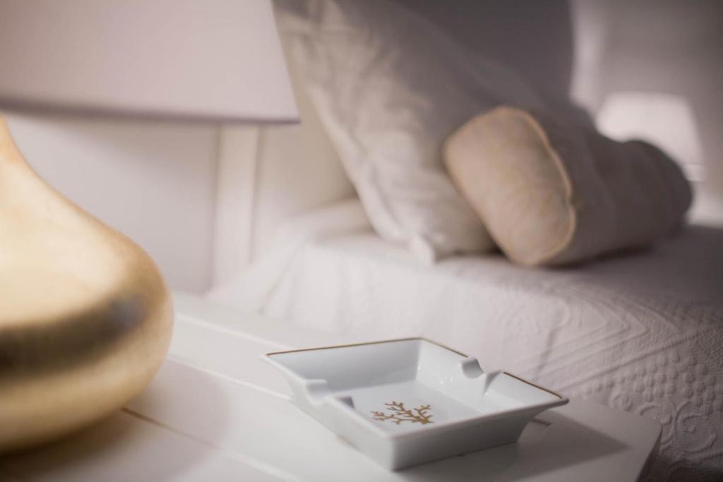 Cama o camas de una habitación en La Settima Luna Hotel
