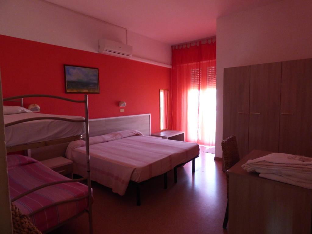 Postel nebo postele na pokoji v ubytování Consul Hotel