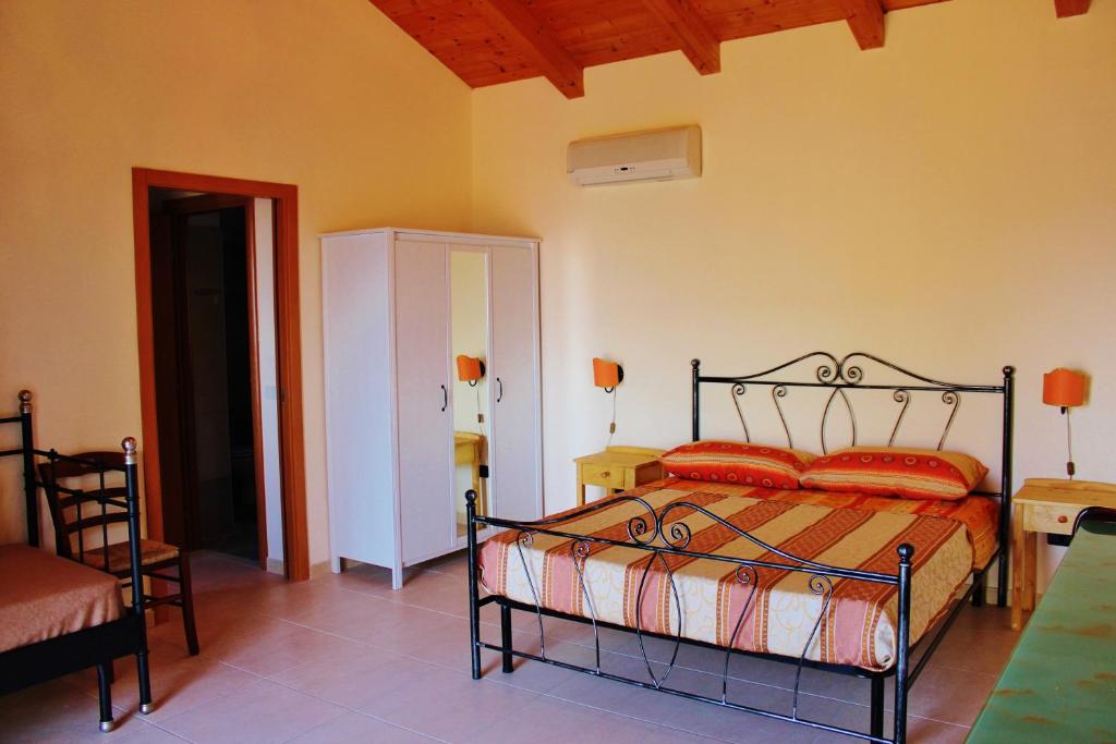Postelja oz. postelje v sobi nastanitve Masseria Stamato