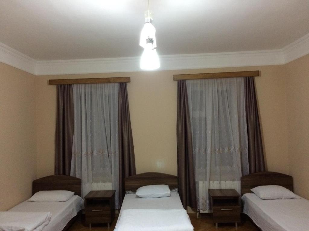 Postel nebo postele na pokoji v ubytování Mari Guest House