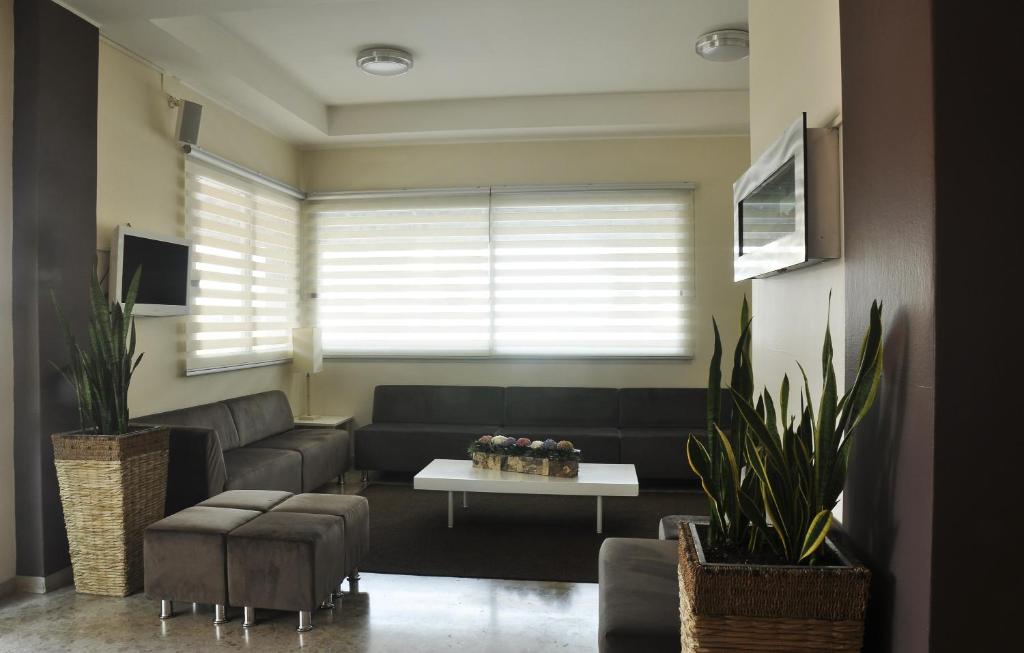 TV a/nebo společenská místnost v ubytování Hotel Madera