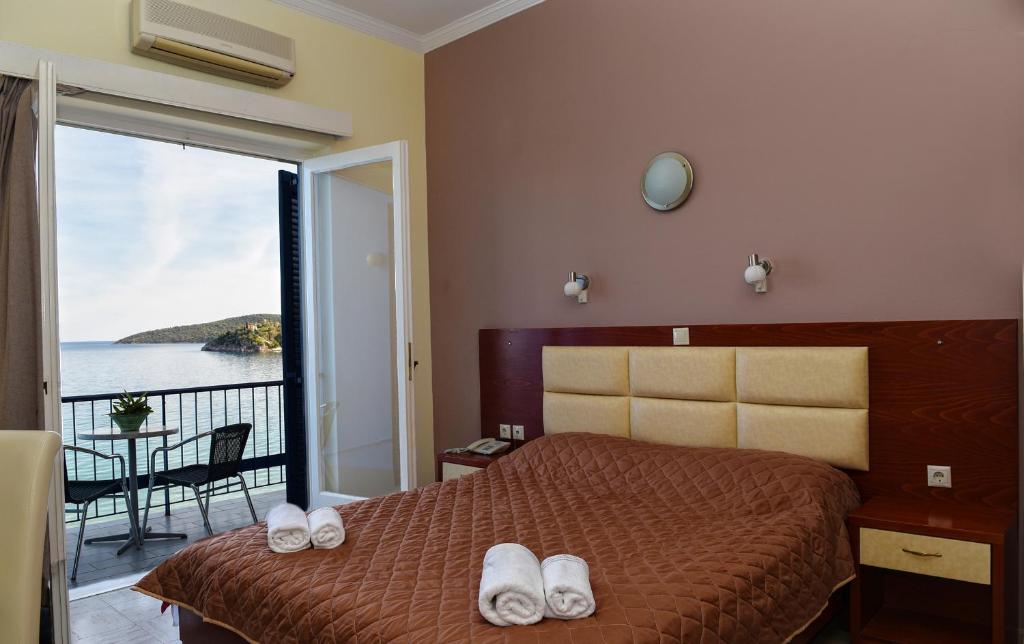 Postel nebo postele na pokoji v ubytování Hotel Solon