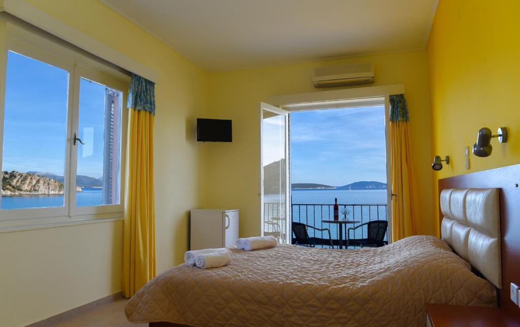 Postel nebo postele na pokoji v ubytování Hotel Solon