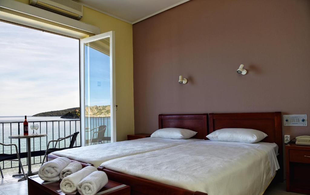Postel nebo postele na pokoji v ubytování Hotel Solon