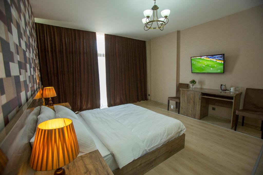 TV a/nebo společenská místnost v ubytování Ire Palace