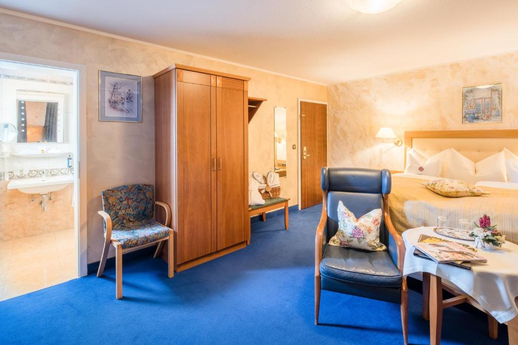 Postel nebo postele na pokoji v ubytování Hotel Krone Igelsberg