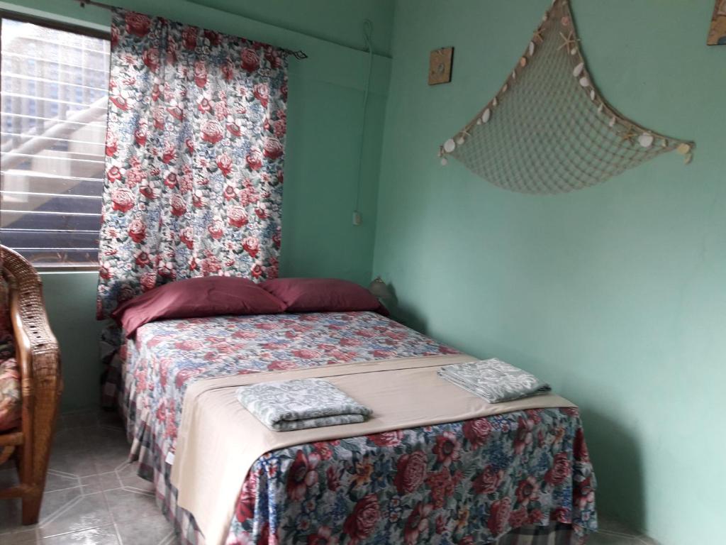 Кровать или кровати в номере Villy's Cottage