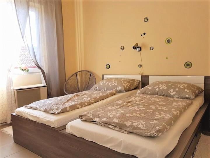 Postel nebo postele na pokoji v ubytování Kovács Vendégház