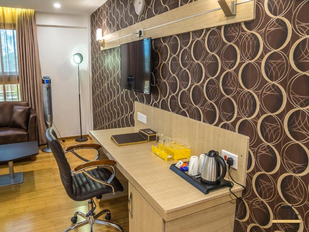 TV a/nebo společenská místnost v ubytování The Ole-Ken Hotel