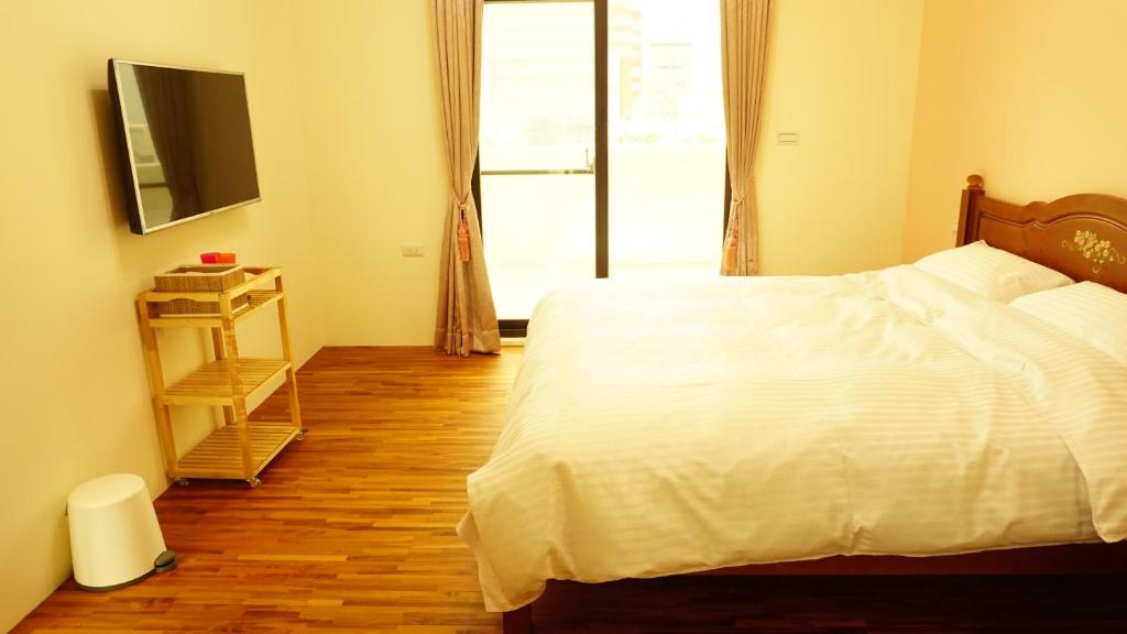 TV a/nebo společenská místnost v ubytování Warm Home