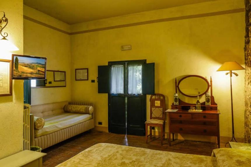 Voodi või voodid majutusasutuse Il Poggio di Teo toas