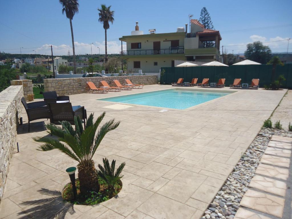 Bazén v ubytování Almyra Apartments & Suites nebo v jeho okolí