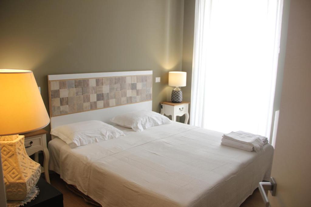 Postel nebo postele na pokoji v ubytování Residenza del Maestro