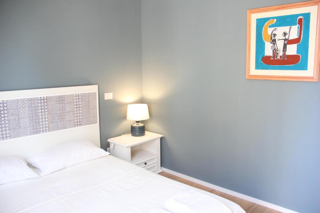 Postel nebo postele na pokoji v ubytování Residenza del Maestro