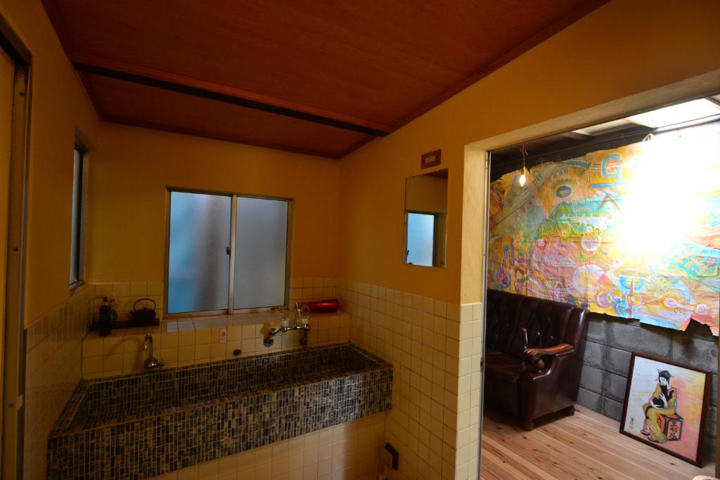 Koupelna v ubytování Izumo guesthouse itoan