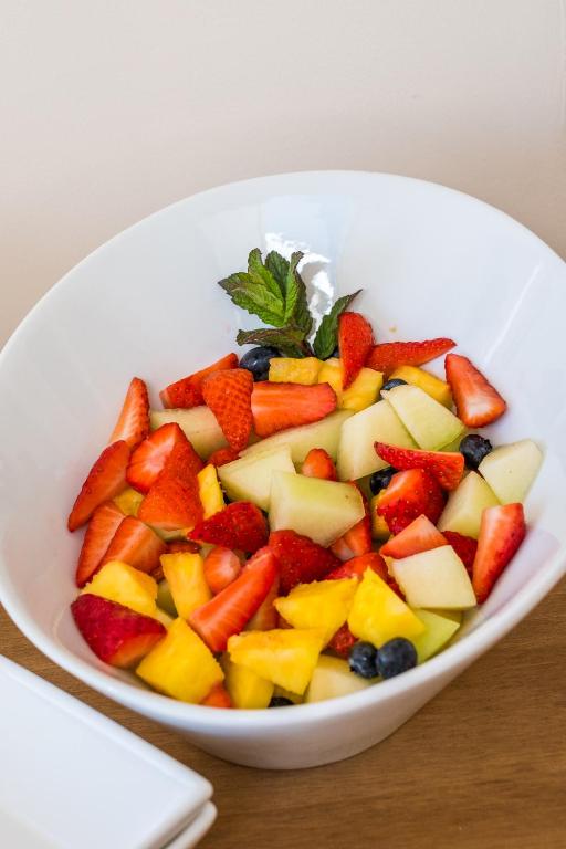 a bowl of fruit and vegetables on a table at Lazy Days in Whitby