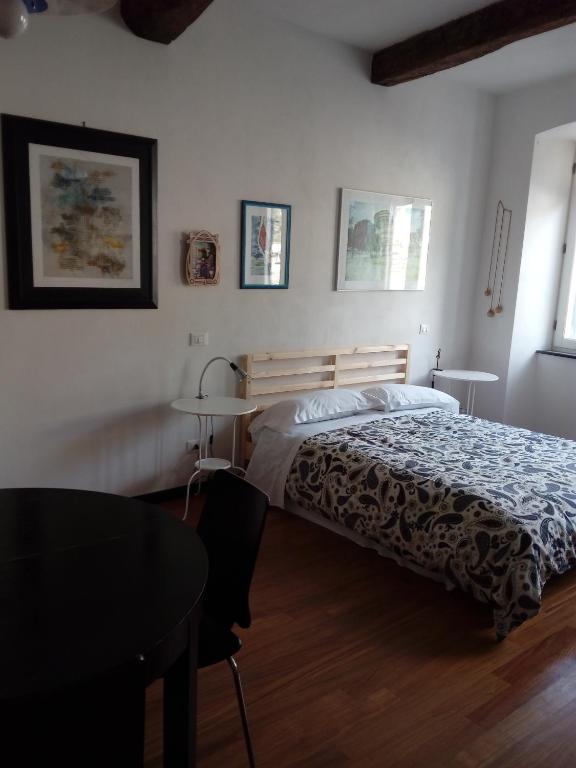 Postel nebo postele na pokoji v ubytování La Scala Vernazza CinqueTerre