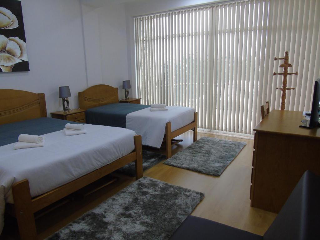 Postel nebo postele na pokoji v ubytování Marficas Hostel