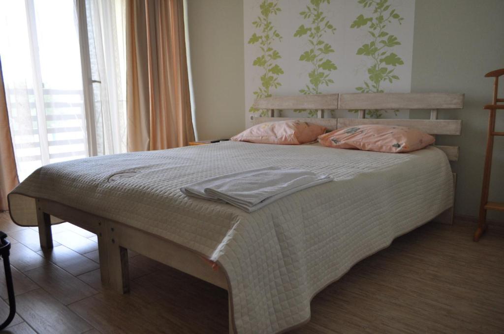 Postel nebo postele na pokoji v ubytování Inn Estio