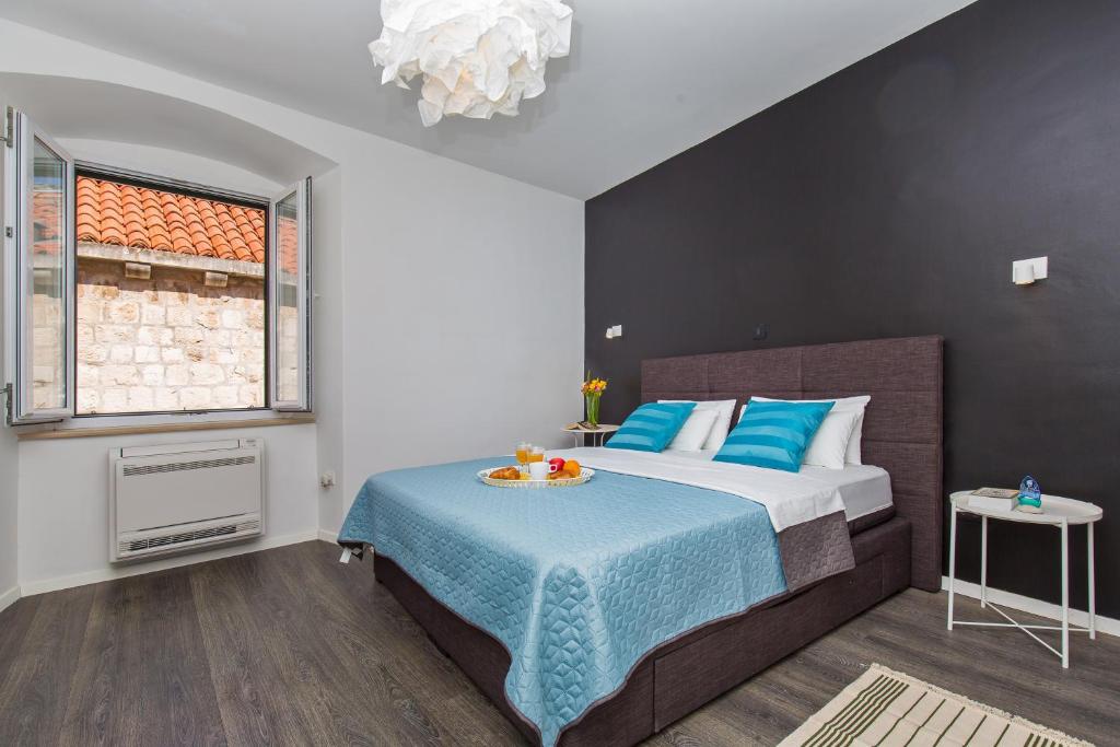 Posteľ alebo postele v izbe v ubytovaní Apartment & Room Joy