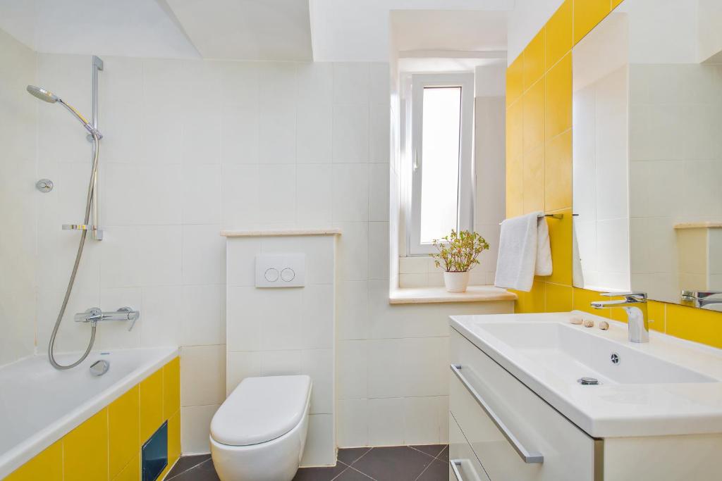 Kúpeľňa v ubytovaní Apartment & Room Joy